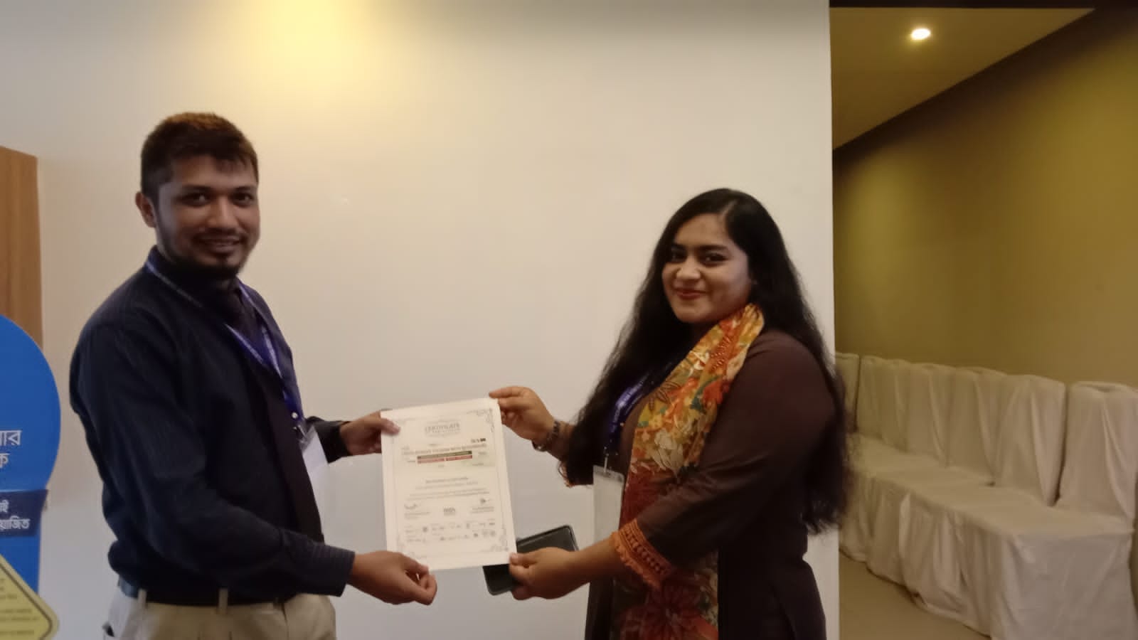 Ershad Ullah Khan is receiving training certificate for day long tourism services